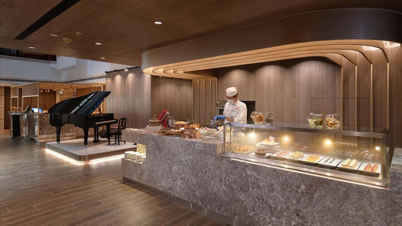 The Howard Plaza Hotel Гаосюн Экстерьер фото The Wing at Hong Kong International Airport
