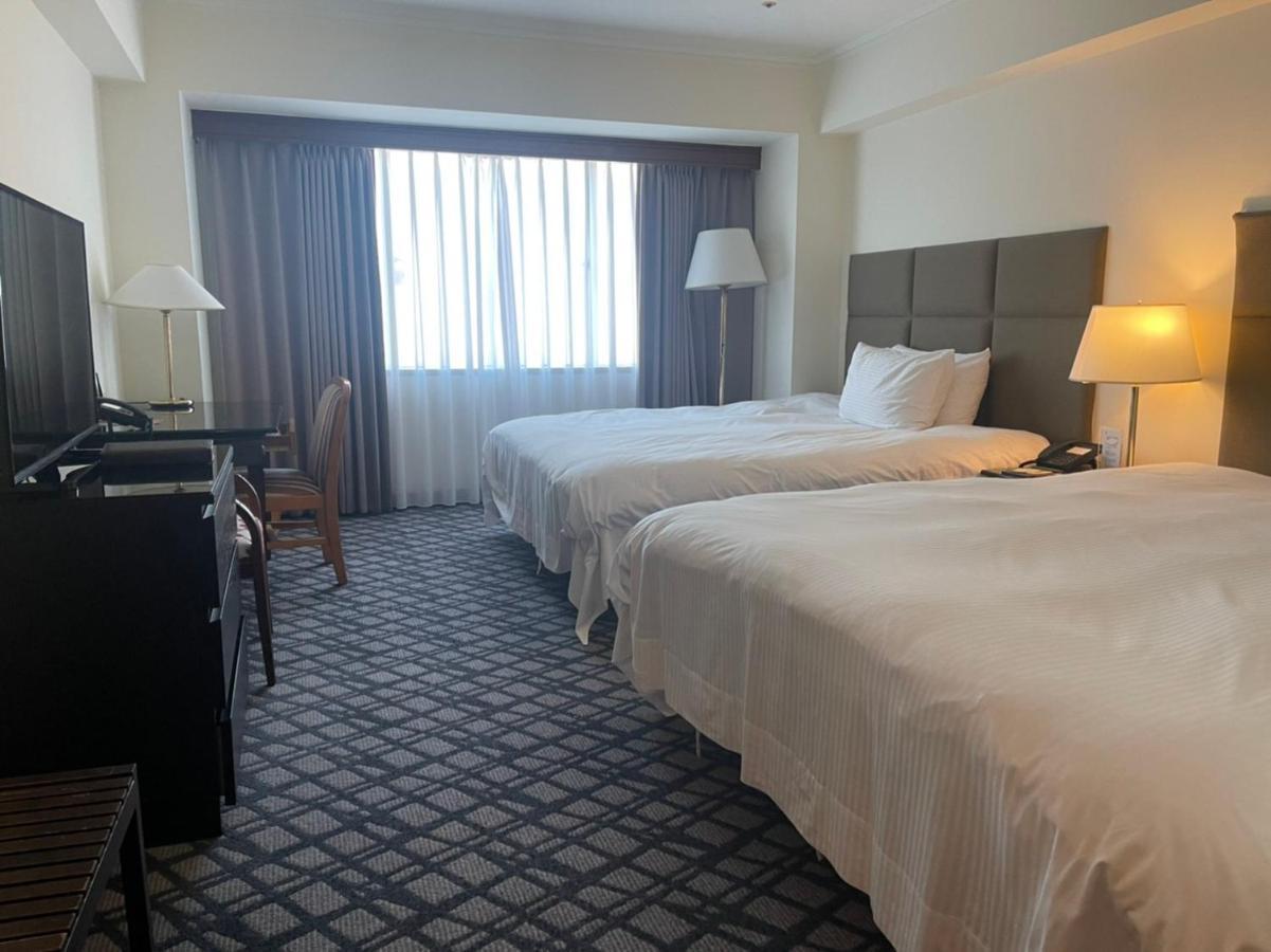 The Howard Plaza Hotel Гаосюн Экстерьер фото A room at the hotel