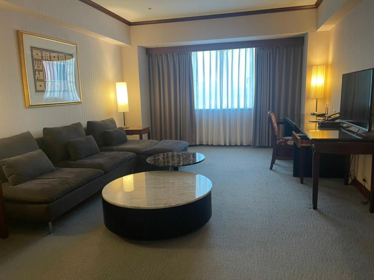 The Howard Plaza Hotel Гаосюн Экстерьер фото A suite at the hotel